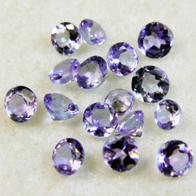 FULL 1/2 ct. FACETED SCARCE TANZANITE (12+ STONES).  