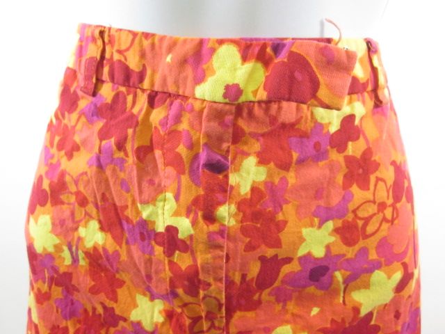 you are bidding on a pair of j mclaughlin orange floral print pants 