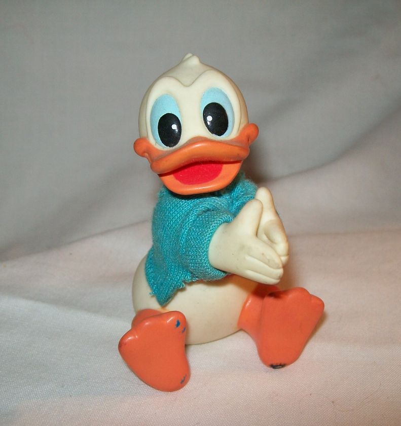   white plastic pinch back Donald Duck 3 high fabric blue shirt  